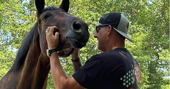 Person at Wild Hearts Therapeutic Equestrian Program